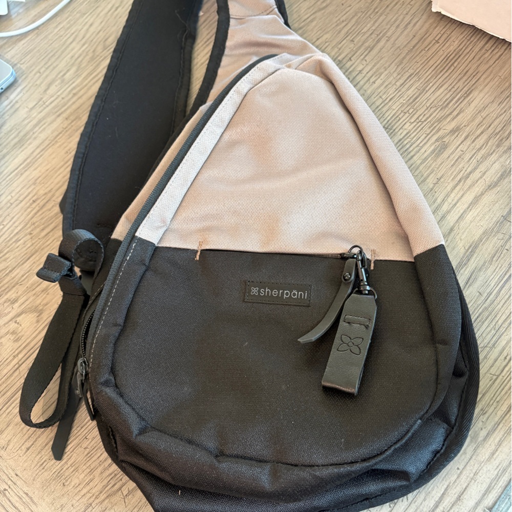 Sherpani Black and Tan Women’s  Sling Bag